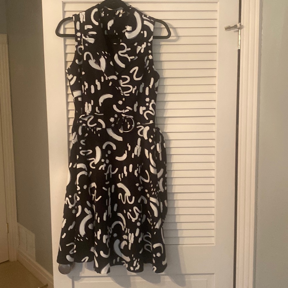 Never worn dress with belt.